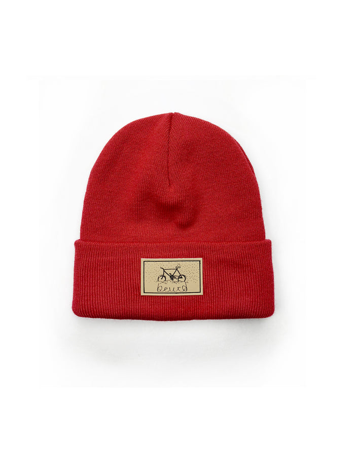 Bonnet rouge avec patch de broderie vélo en cuirette